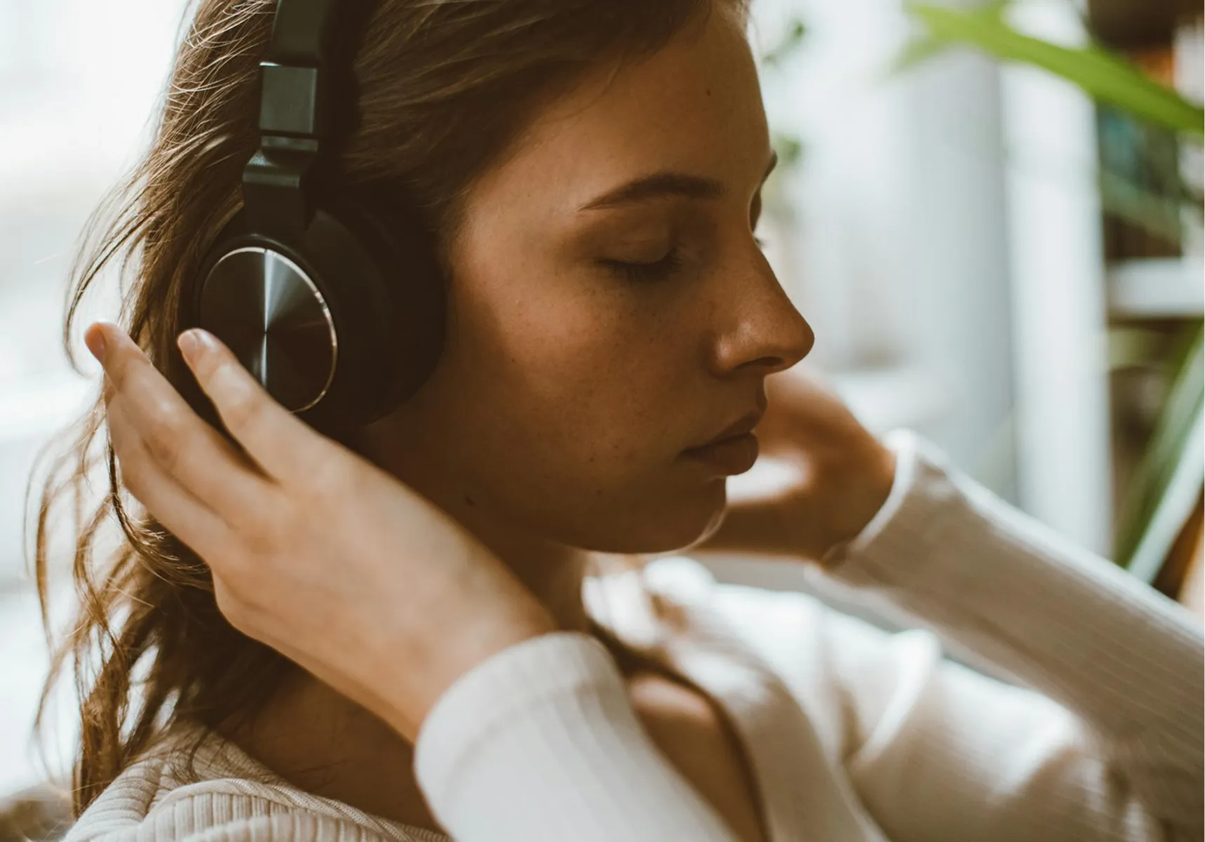 Relaxing at home with headphones on